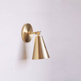 One-Light Adjustable Wall Sconce with Large Brass Cone