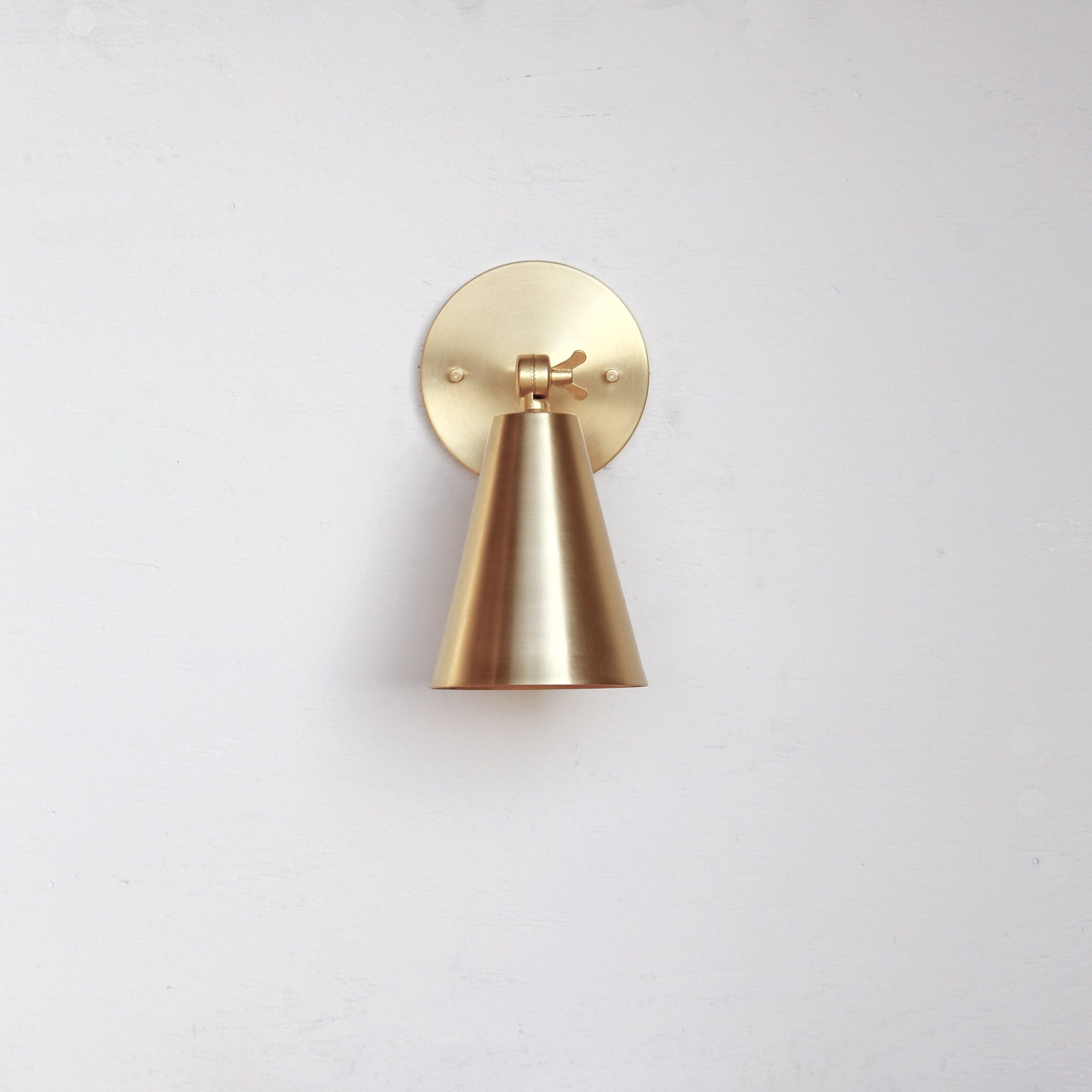 One-Light Adjustable Wall Sconce with Large Brass Cone