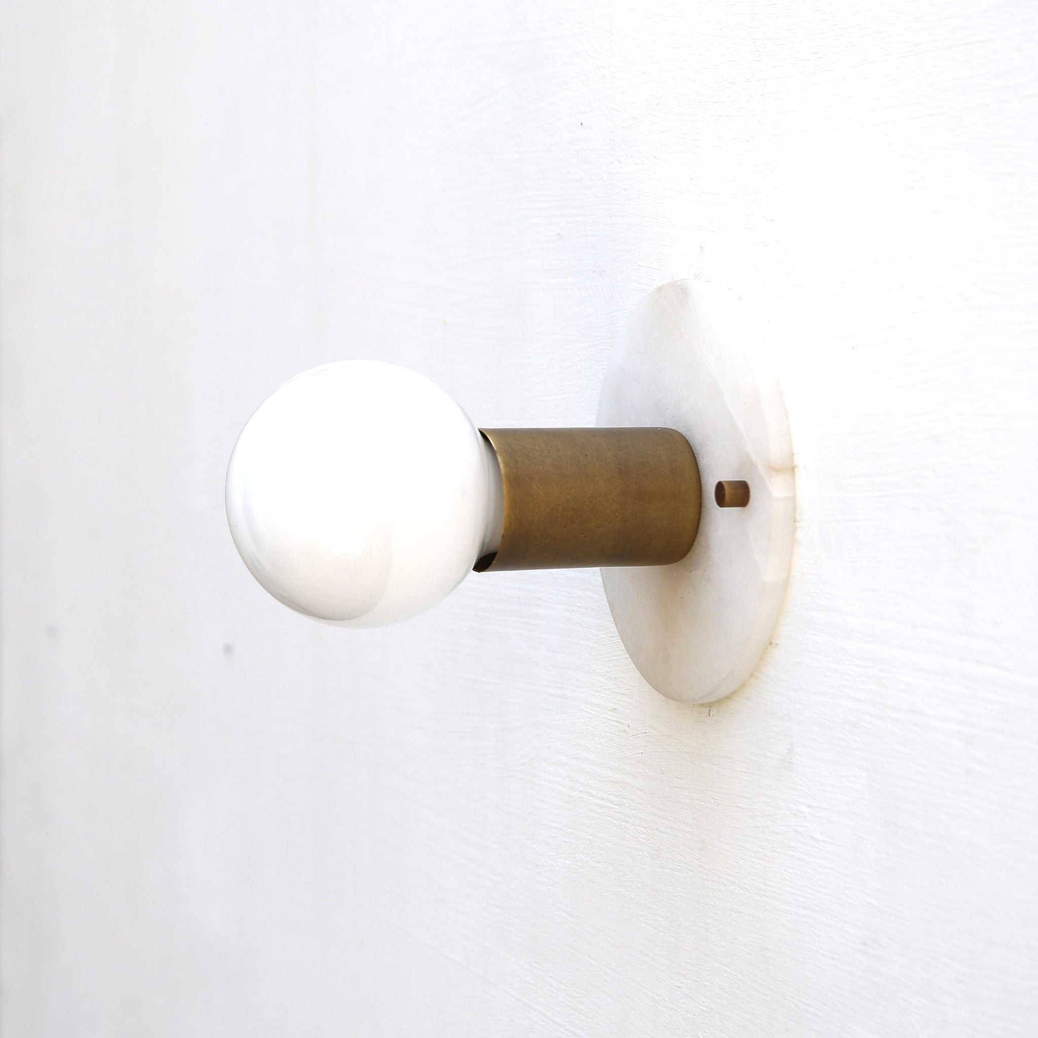 One-Light Alabaster Back Plate Sconce with Exposed Bulb