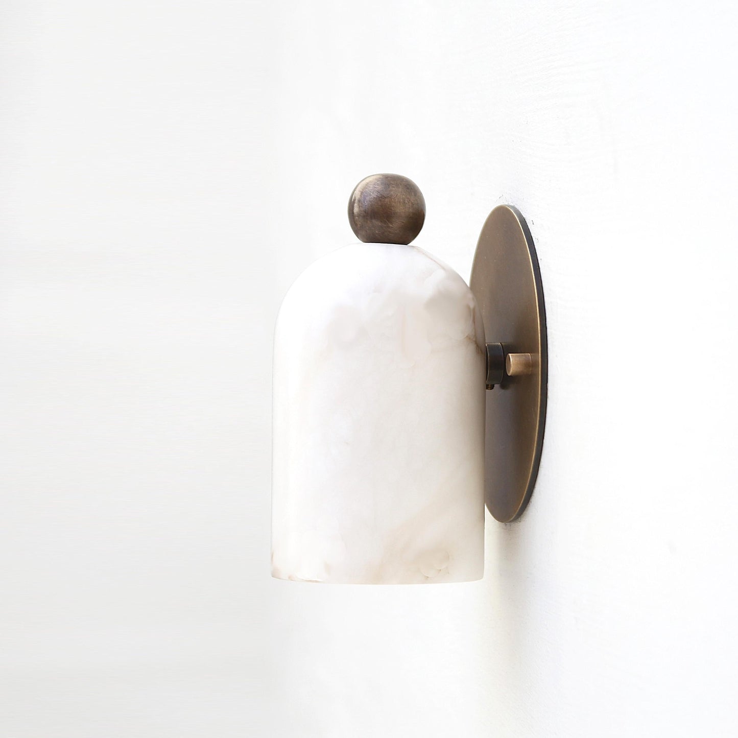 One-Light Alabaster Wall Sconce with Round Brass Backplate