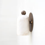 One-Light Alabaster Wall Sconce with Round Brass Backplate