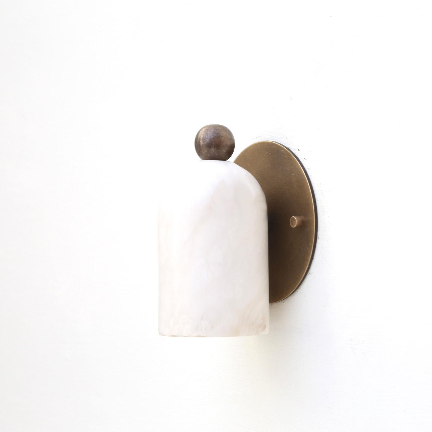 One-Light Alabaster Wall Sconce with Round Brass Backplate