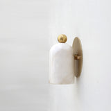 One-Light Alabaster Wall Sconce with Round Brass Backplate
