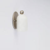One-Light Alabaster Wall Sconce with Round Brass Backplate