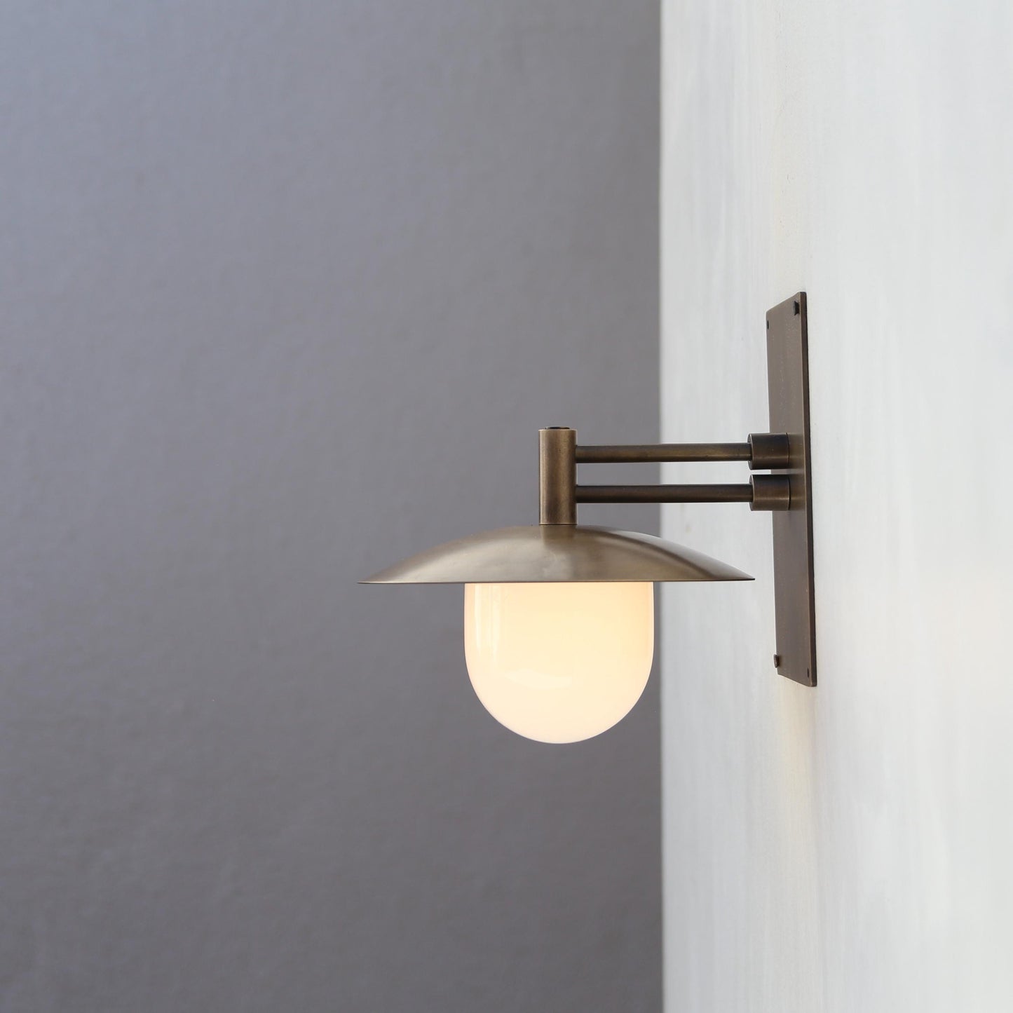 One-Light Articulating Wall Sconce with 9-Inch Opal Glass Shade