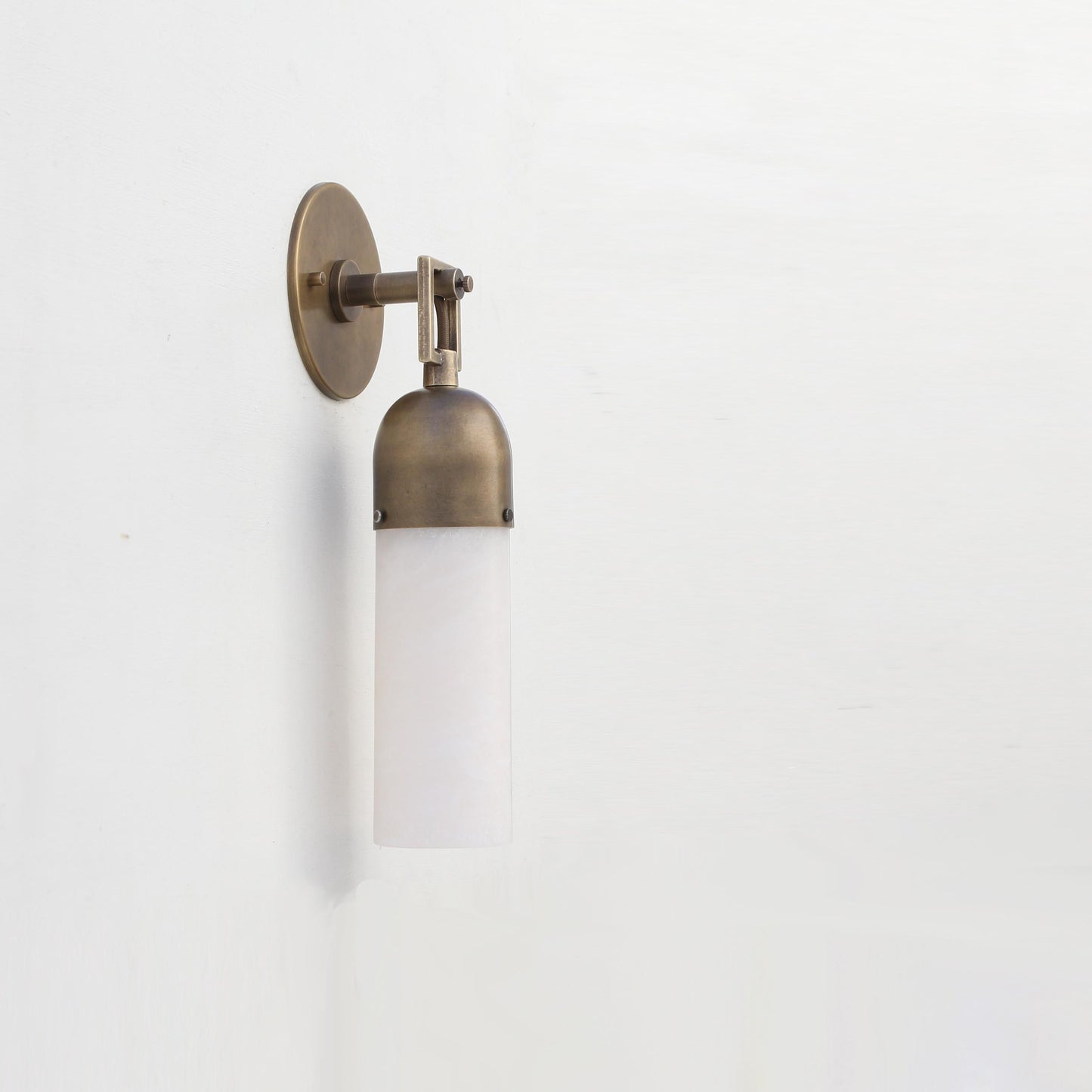 One-Light Brass and Alabaster Cylinder Vanity Sconce