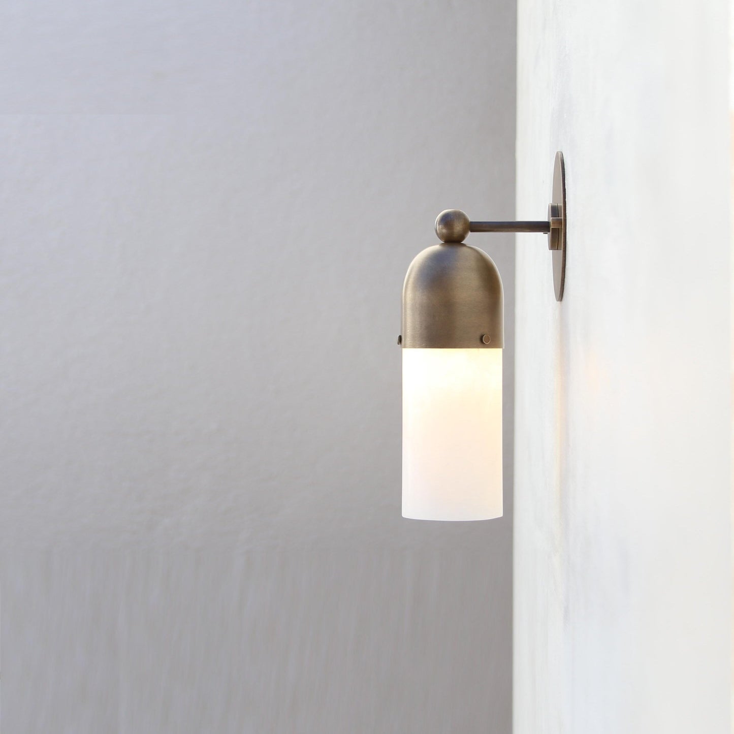 One-Light Brass Cap Wall Sconce with Frosted Glass Tube
