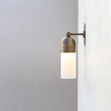 One-Light Brass Cap Wall Sconce with Frosted Glass Tube