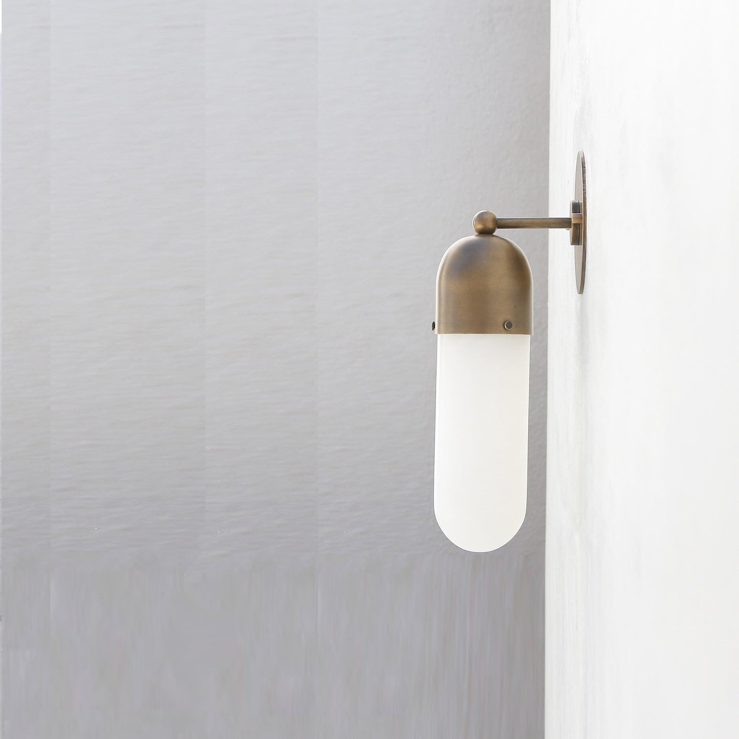 One-Light Brass Cap Wall Sconce with Long Opal Glass Tube