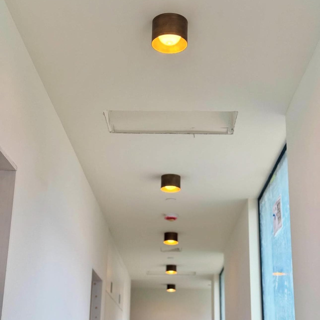 One-Light Brass Cylinder Flush Mount Ceiling Light with Opal Globe