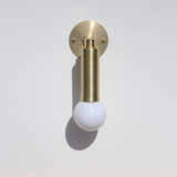 One-Light Brass Cylinder Wall Sconce with Exposed Bulb