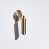 One-Light Brass Cylinder Wall Sconce with Exposed Bulb