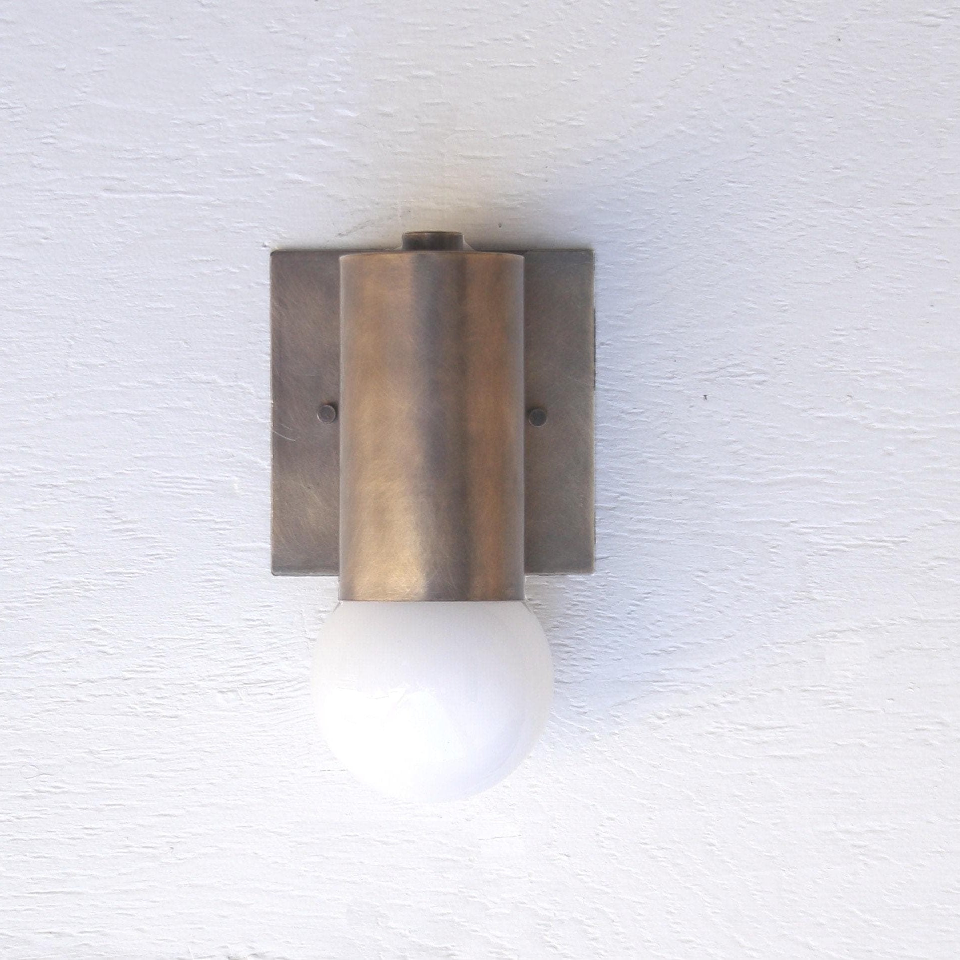 One-Light Brass Cylinder Wall Sconce with Opal Globe
