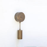 One-Light Brass Cylinder Wall Sconce with Round Backplate