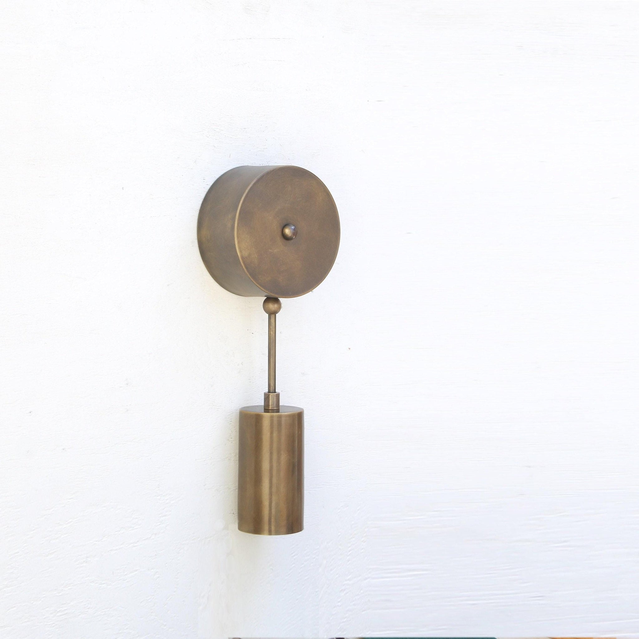 One-Light Brass Cylinder Wall Sconce with Round Backplate