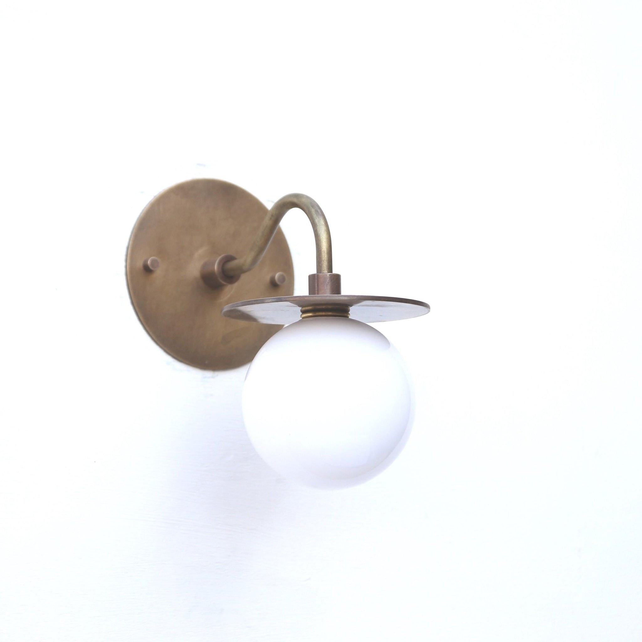 One-Light Brass Disc Wall Sconce with Opal Globe