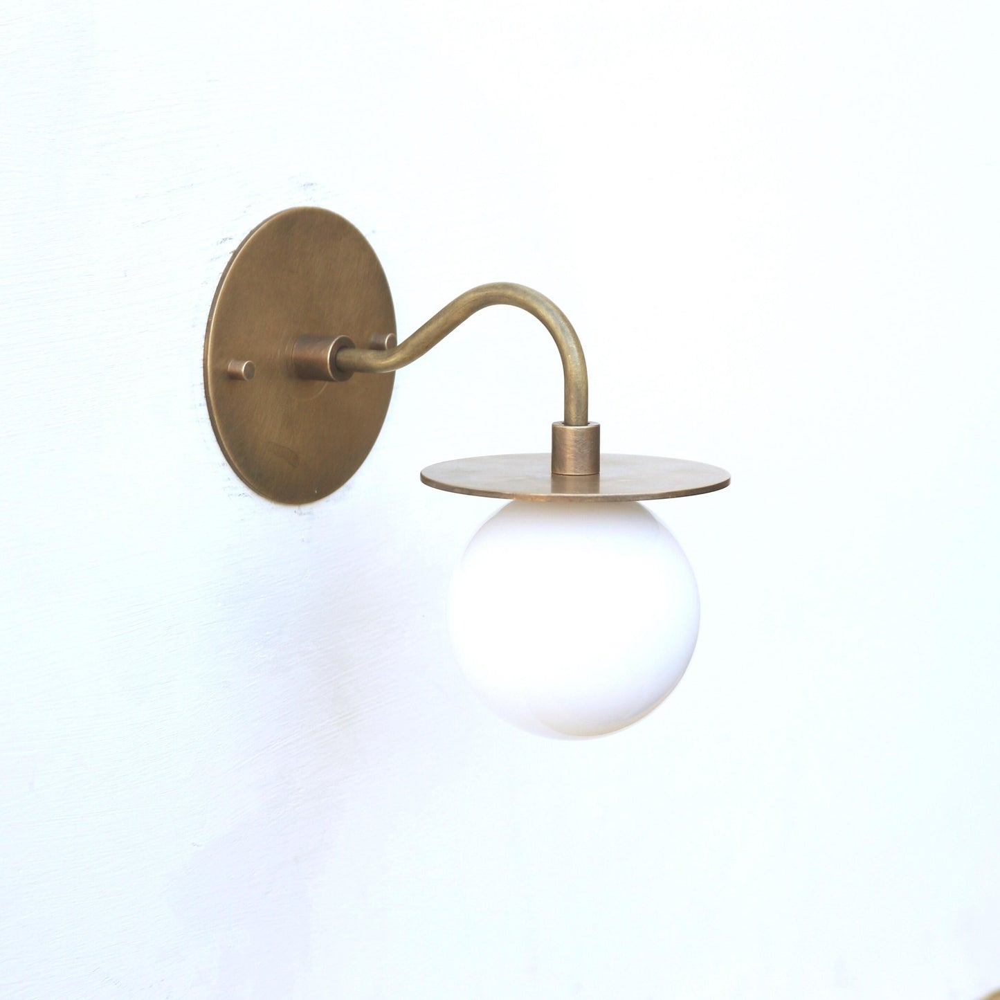 One-Light Brass Disc Wall Sconce with Opal Globe