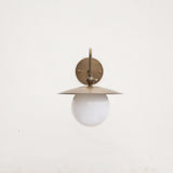 One-Light Brass Dish Wall Sconce with Curved Arm and Milk Glass Shade