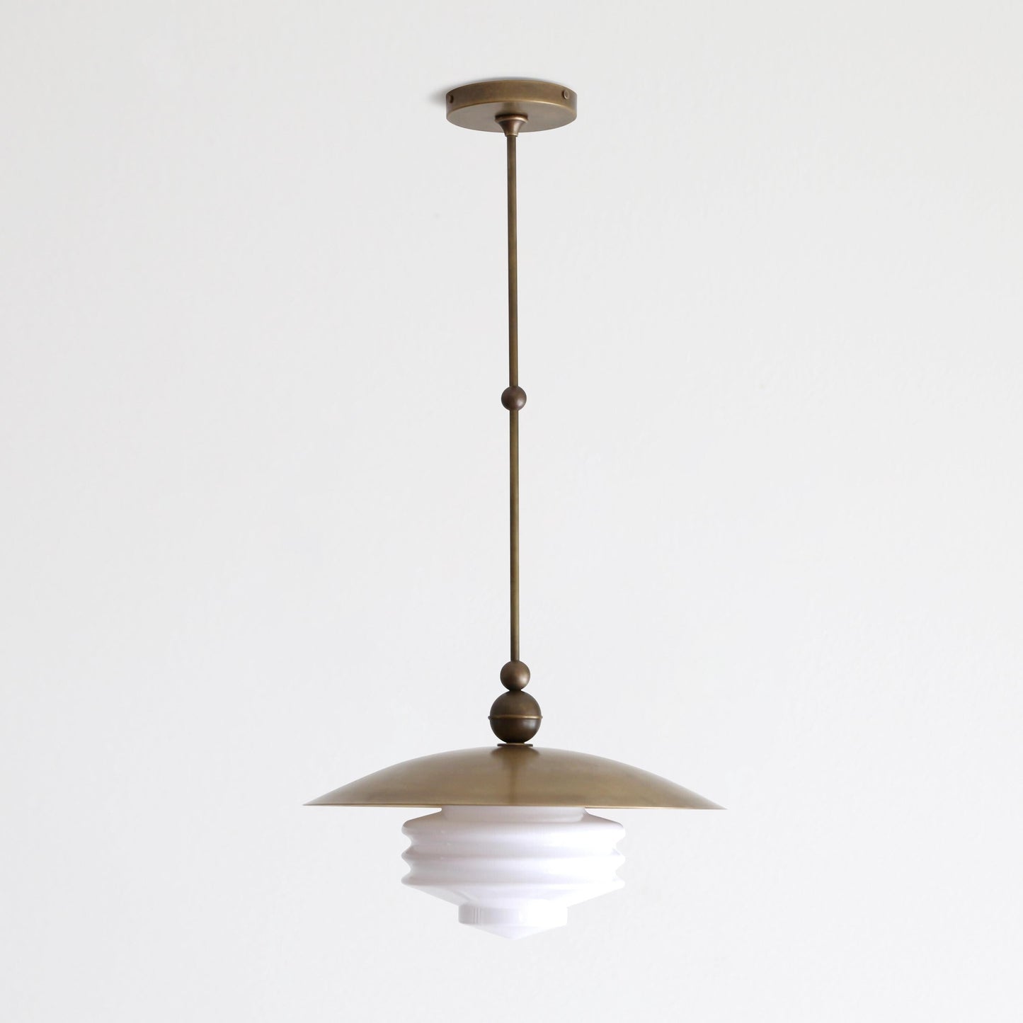 One-Light Brass Dome Pendant with Tiered Opal Glass Shade