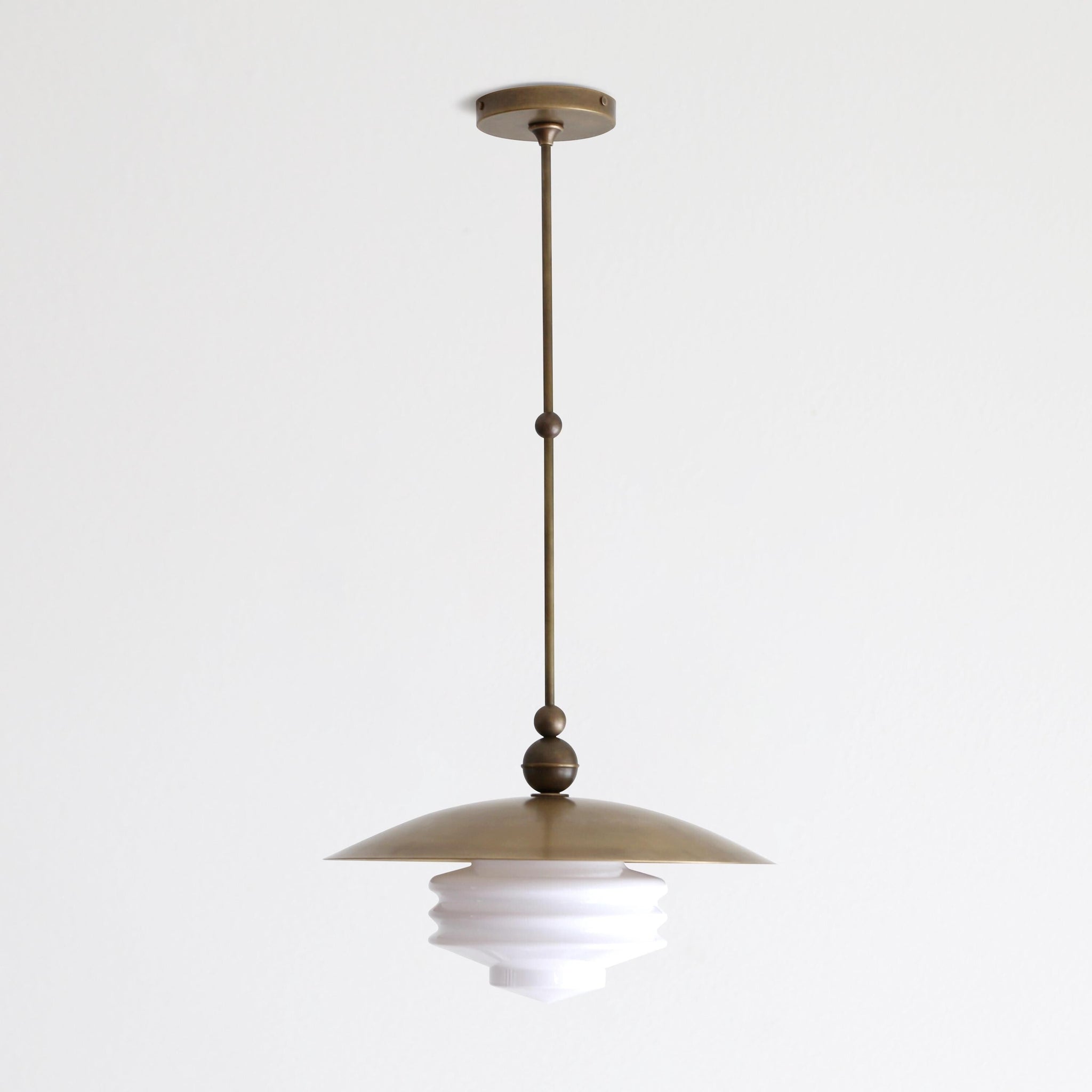 One-Light Brass Dome Pendant with Tiered Opal Glass Shade