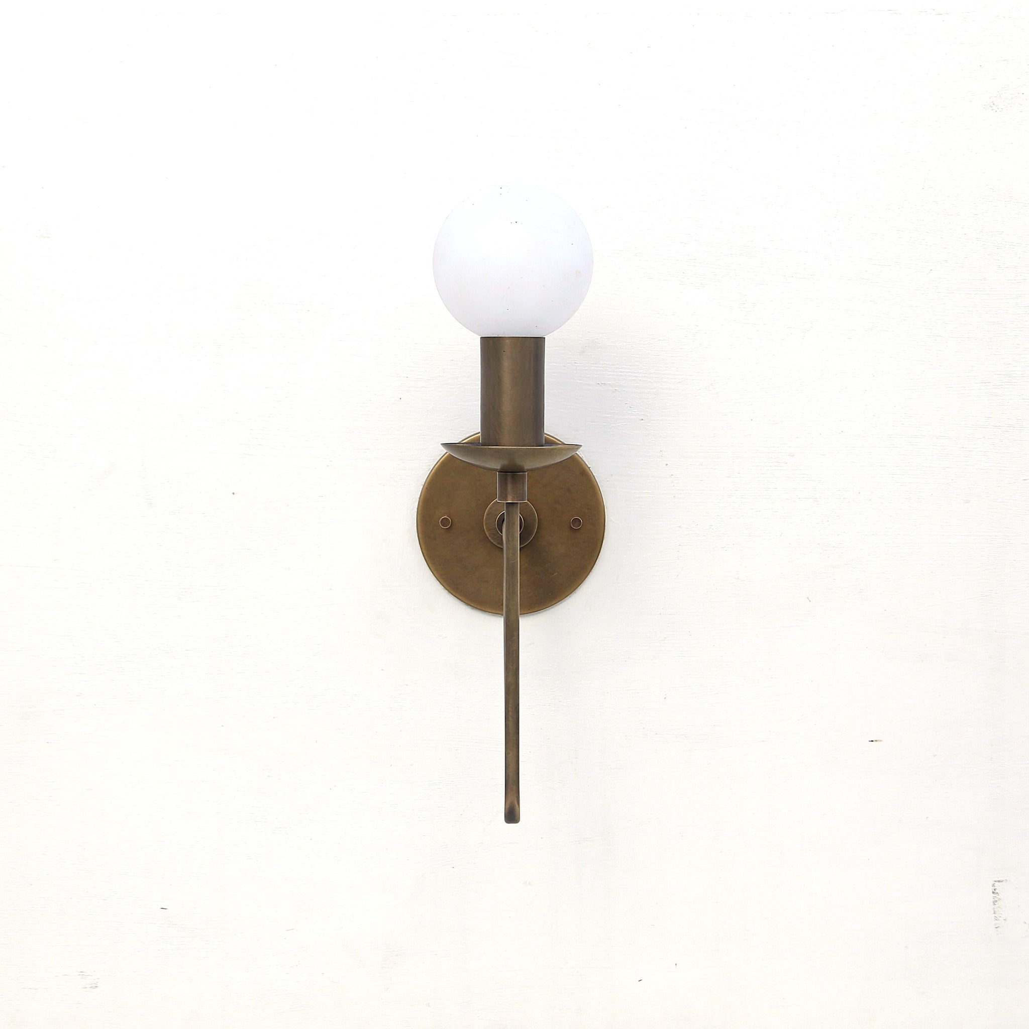 One-Light Brass Sconce with Curved Arm and Opal Glass Globe