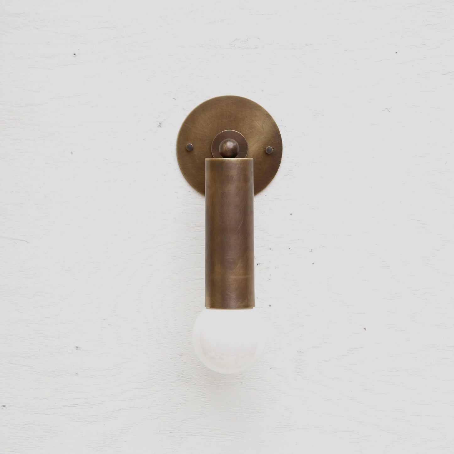 One-Light Brass Sleeve Wall Sconce with Exposed Bulb