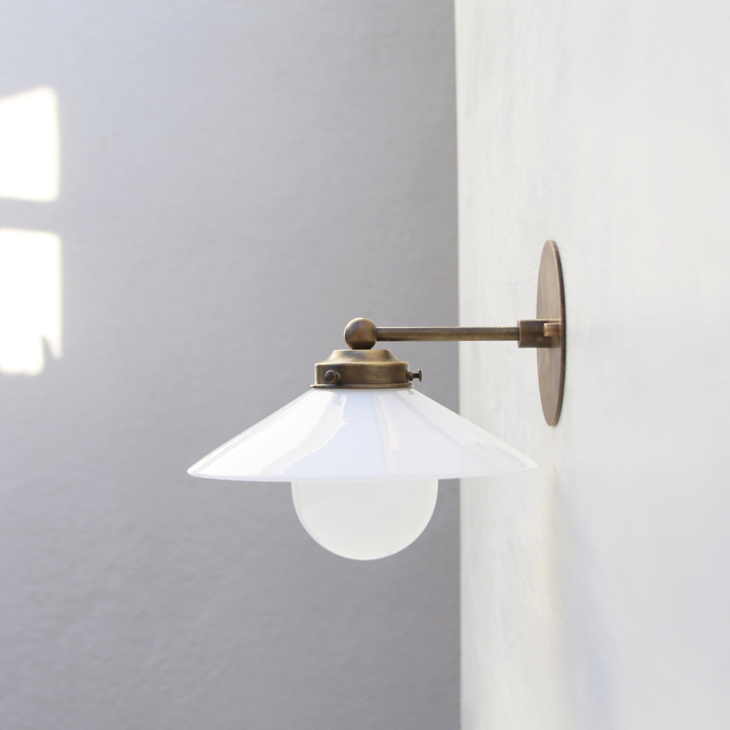 One-Light Brass Wall Sconce with Opal Glass Coolie Shade