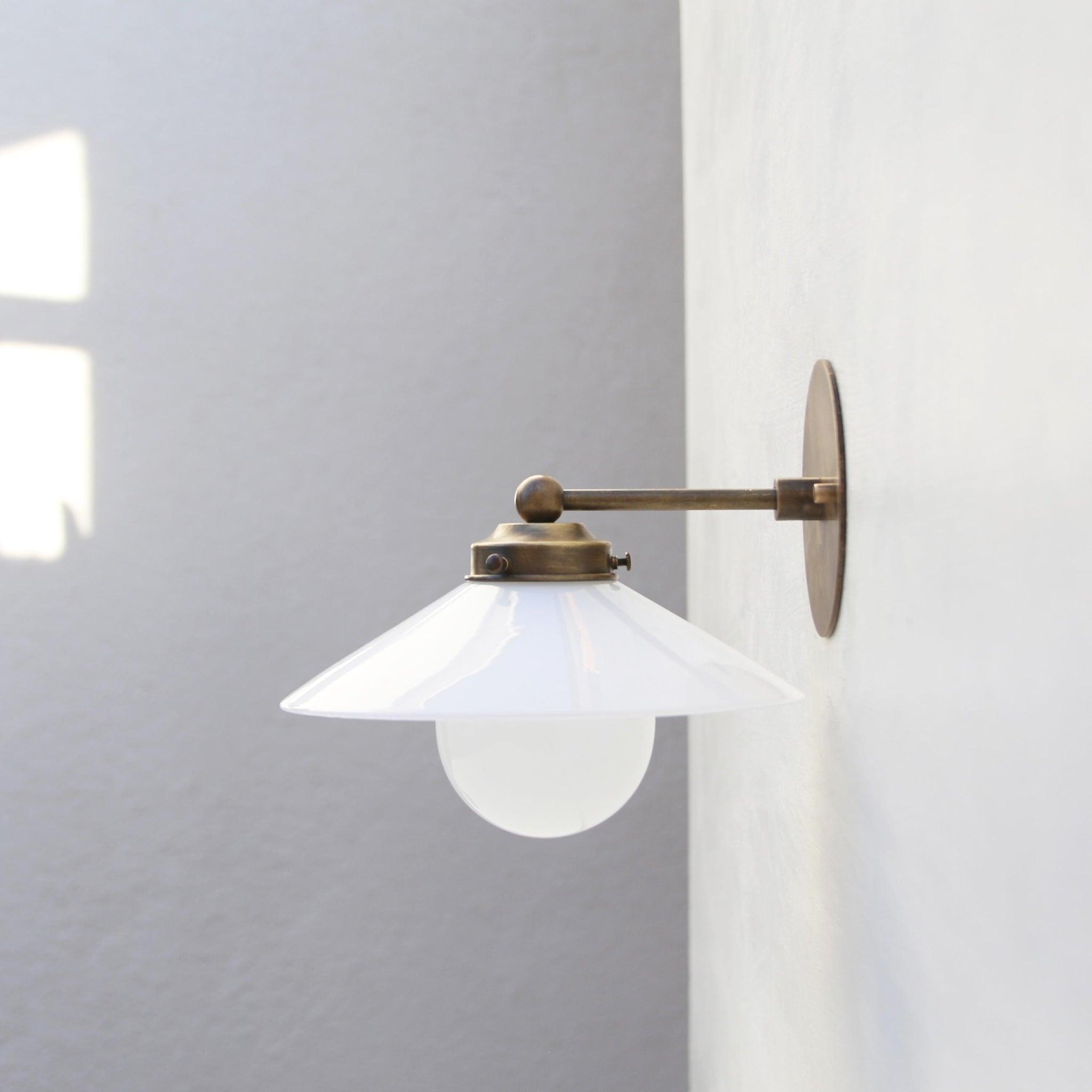 One-Light Brass Wall Sconce with Opal Glass Coolie Shade
