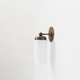 One-Light Brass Wall Sconce with Opal Glass Cylinder Shade