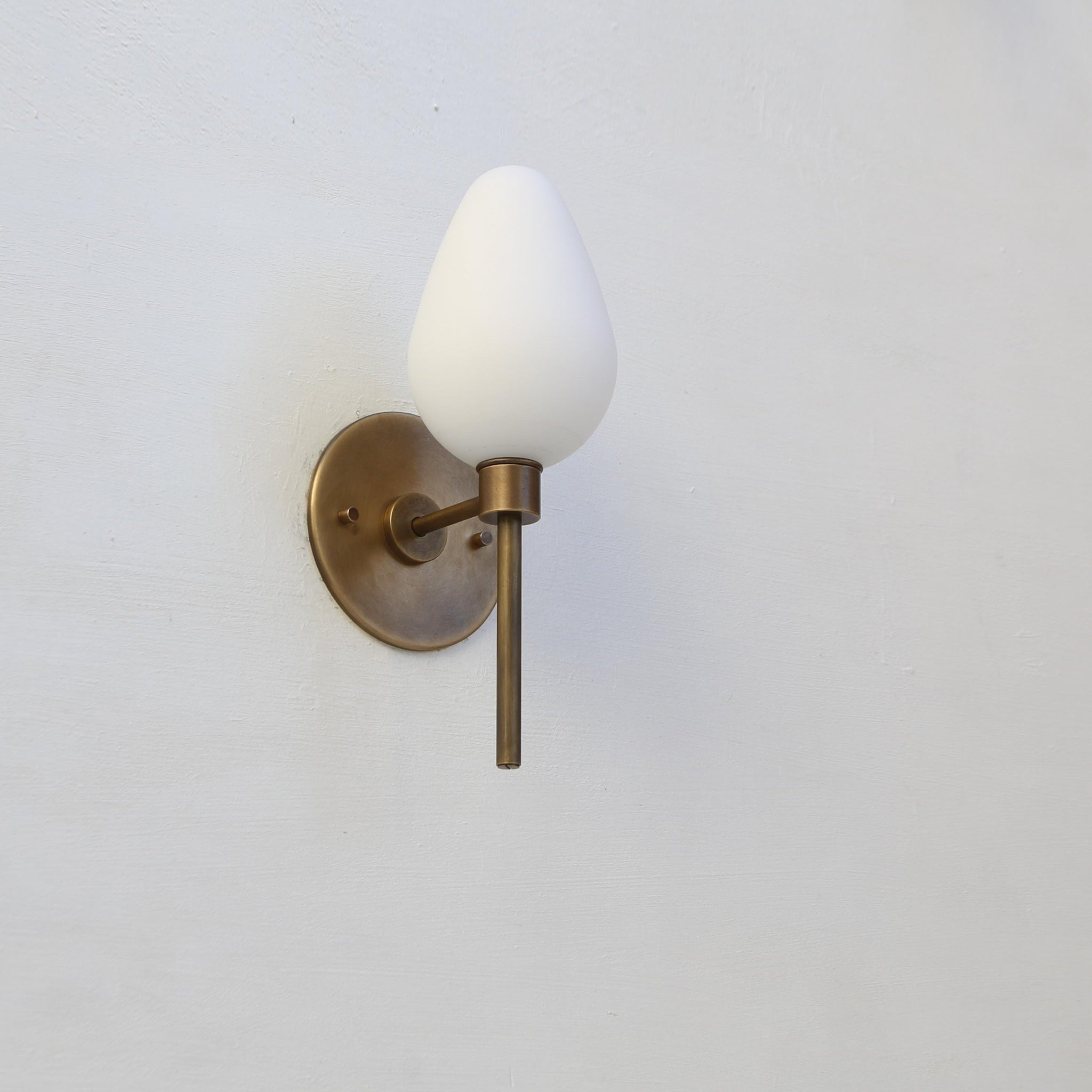 One-Light Brass Wall Sconce with Opal Tulip Shade