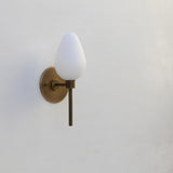 One-Light Brass Wall Sconce with Opal Tulip Shade