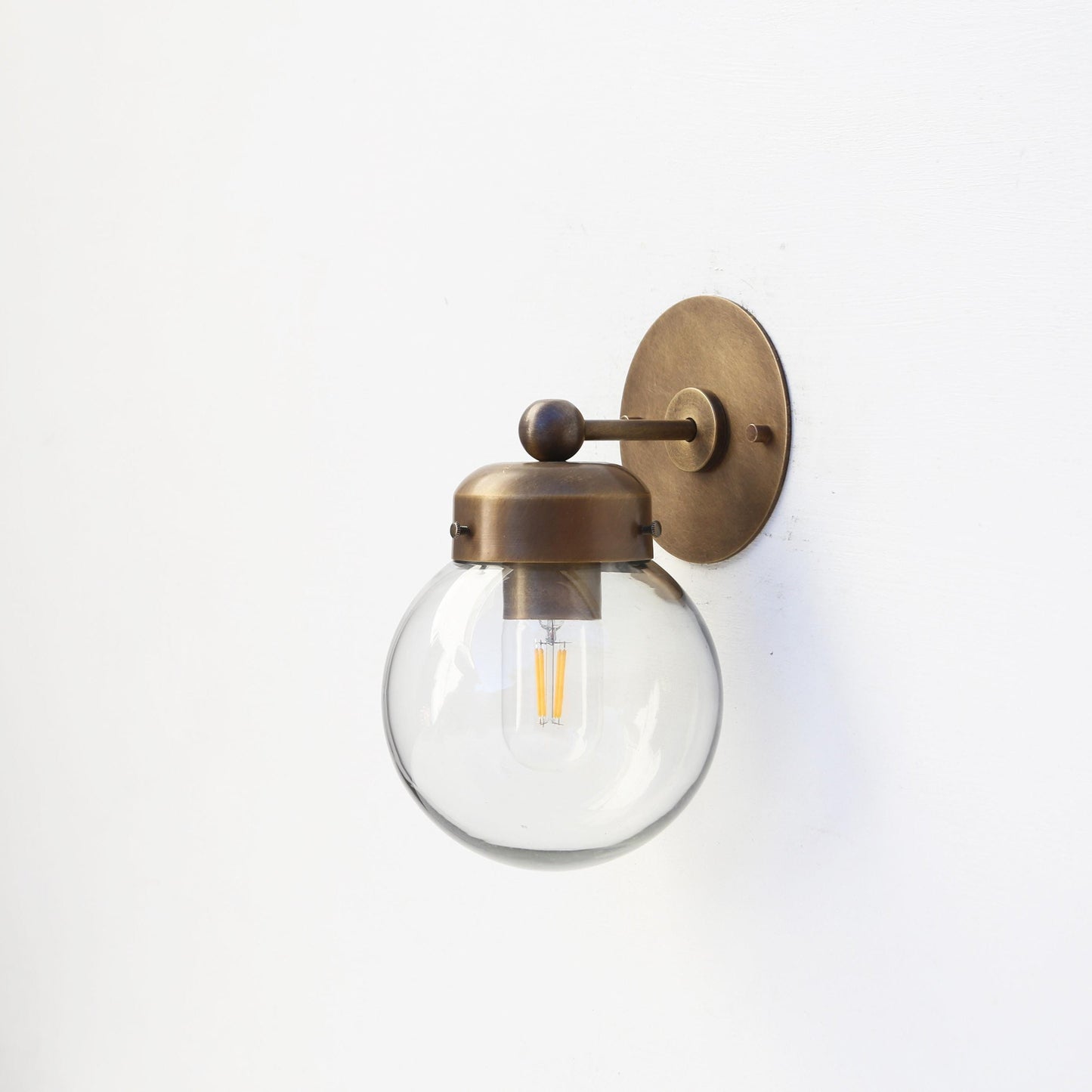 One-Light Clear Glass Globe Wall Sconce