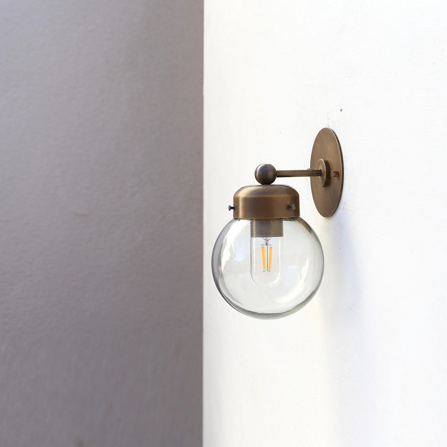 One-Light Clear Glass Globe Wall Sconce