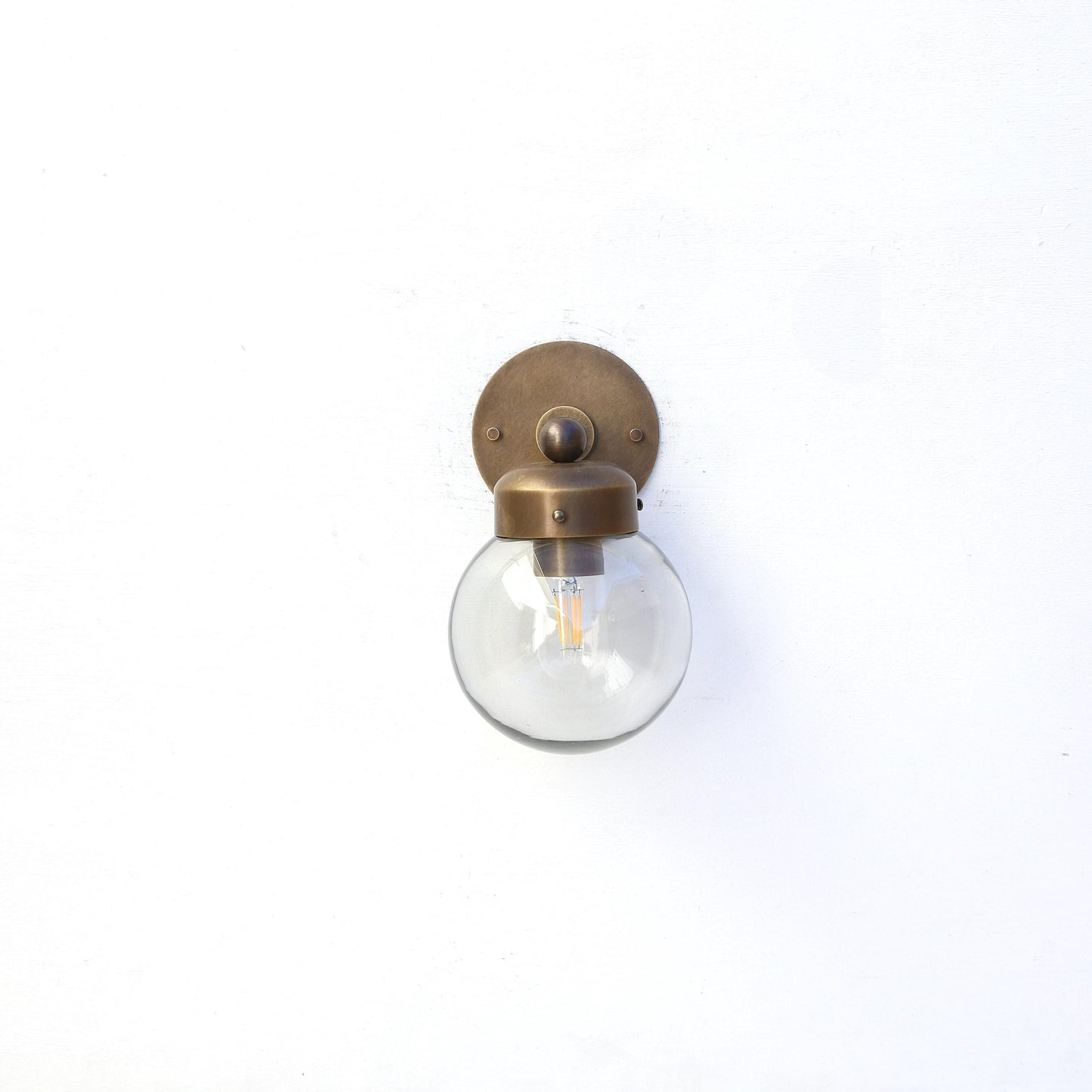 One-Light Clear Glass Globe Wall Sconce
