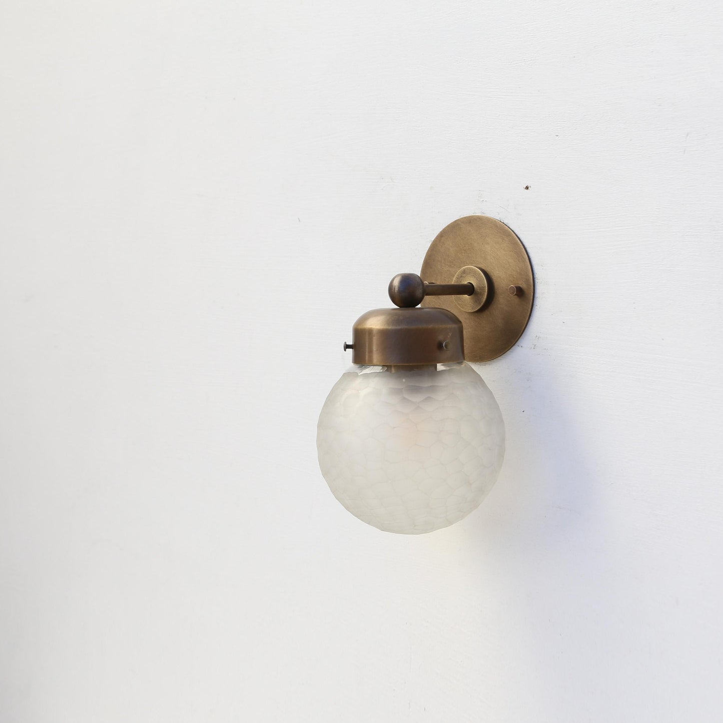 One-Light Compact Diamond-Cut Glass Globe Wall Sconce