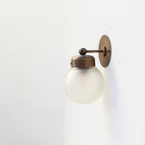 One-Light Compact Diamond-Cut Glass Globe Wall Sconce