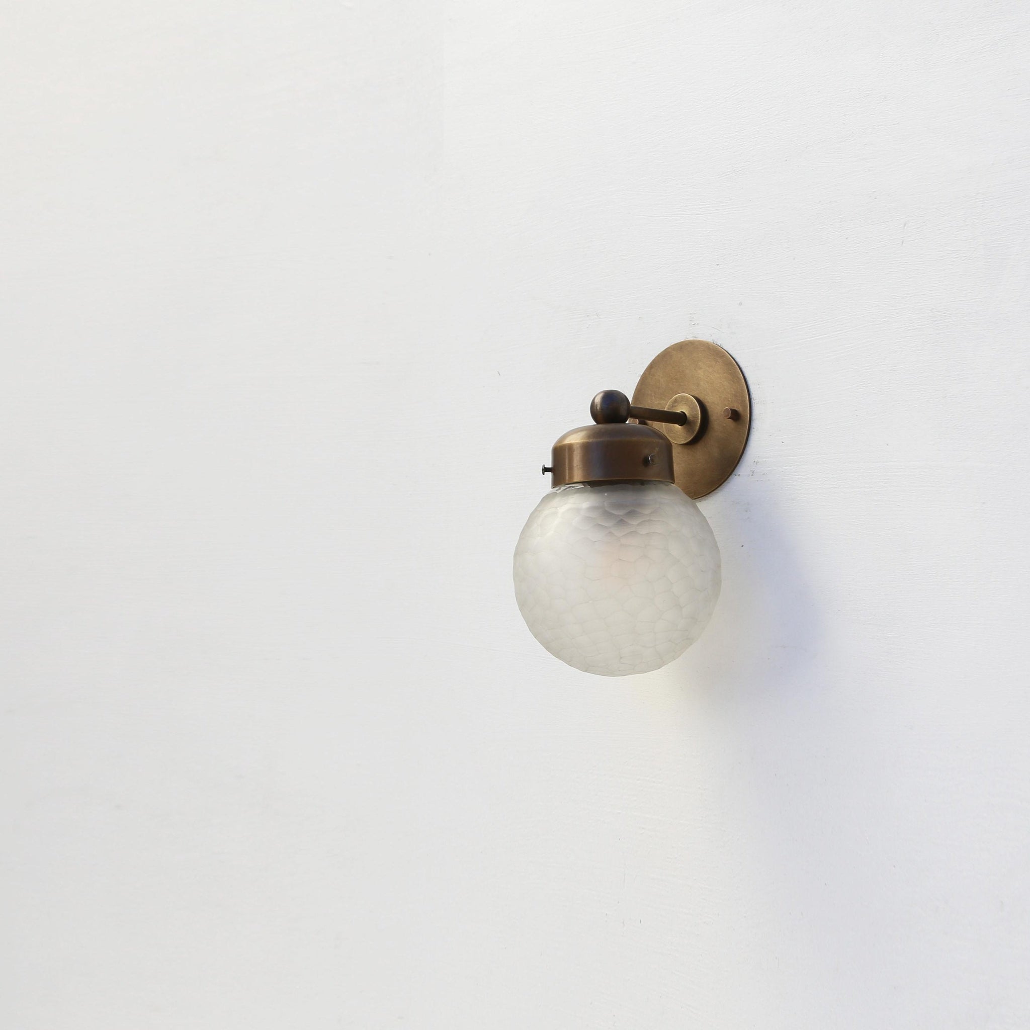 One-Light Compact Diamond-Cut Glass Globe Wall Sconce