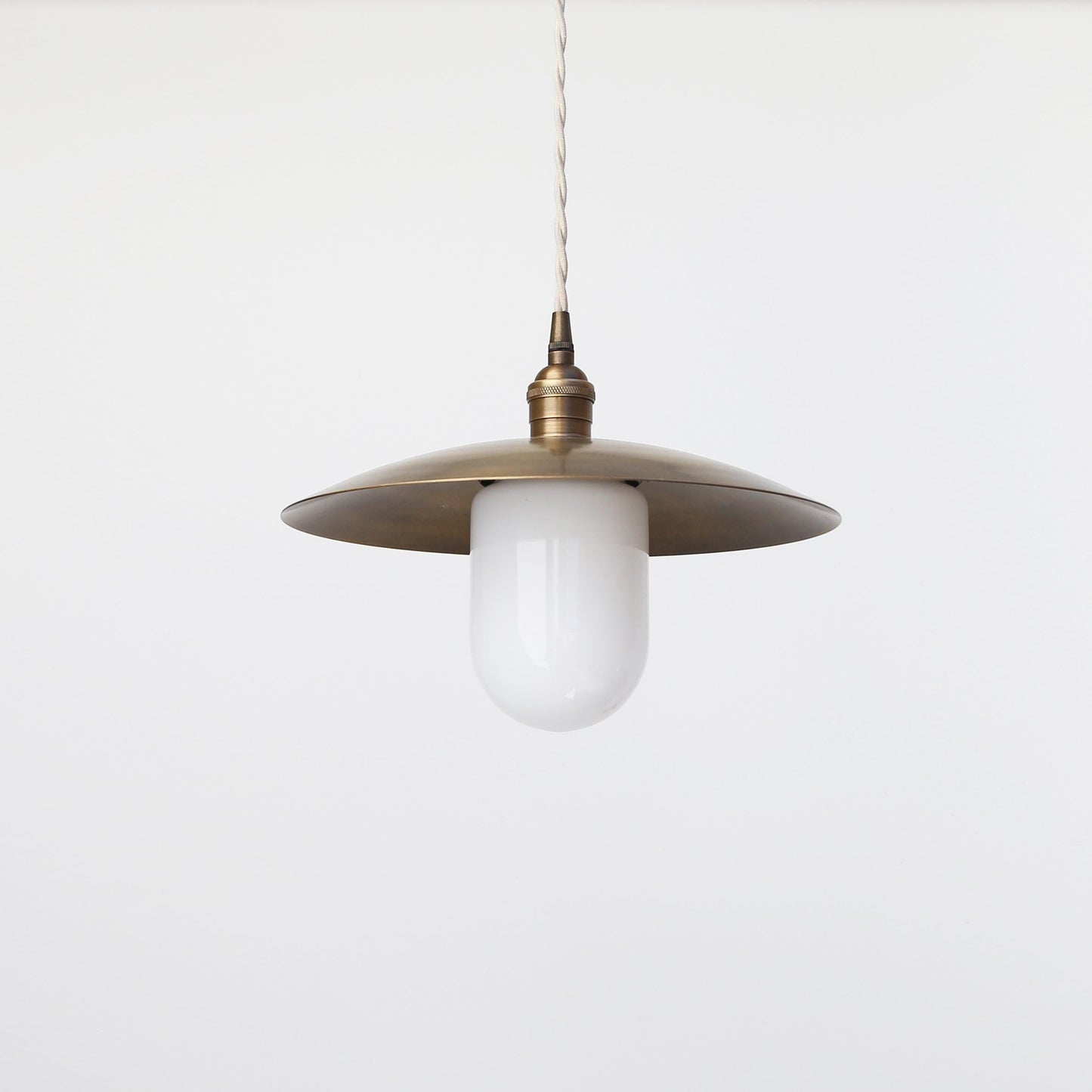 One-Light Cord Pendant with Twelve-Inch Brass Disc Shade