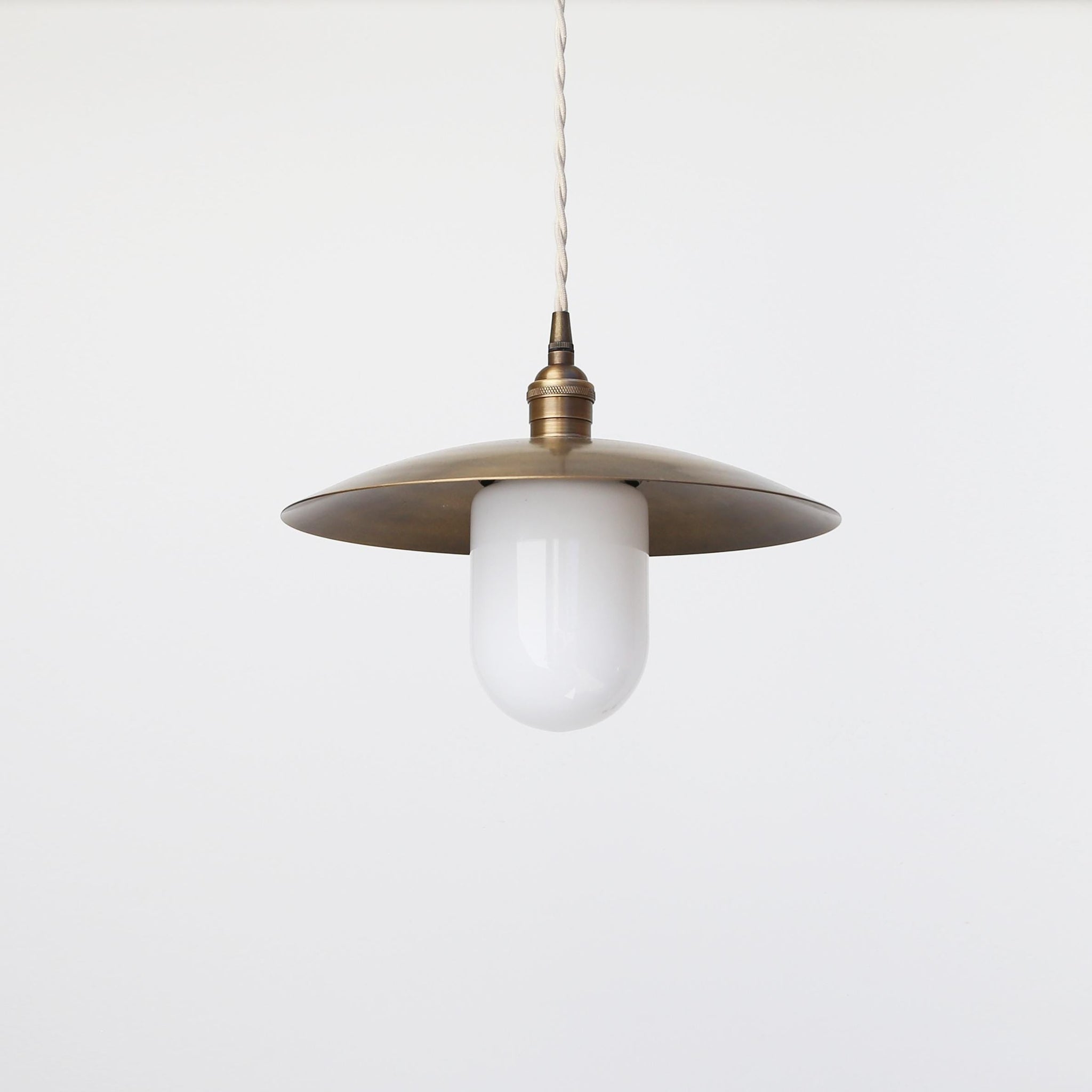 One-Light Cord Pendant with Twelve-Inch Brass Disc Shade