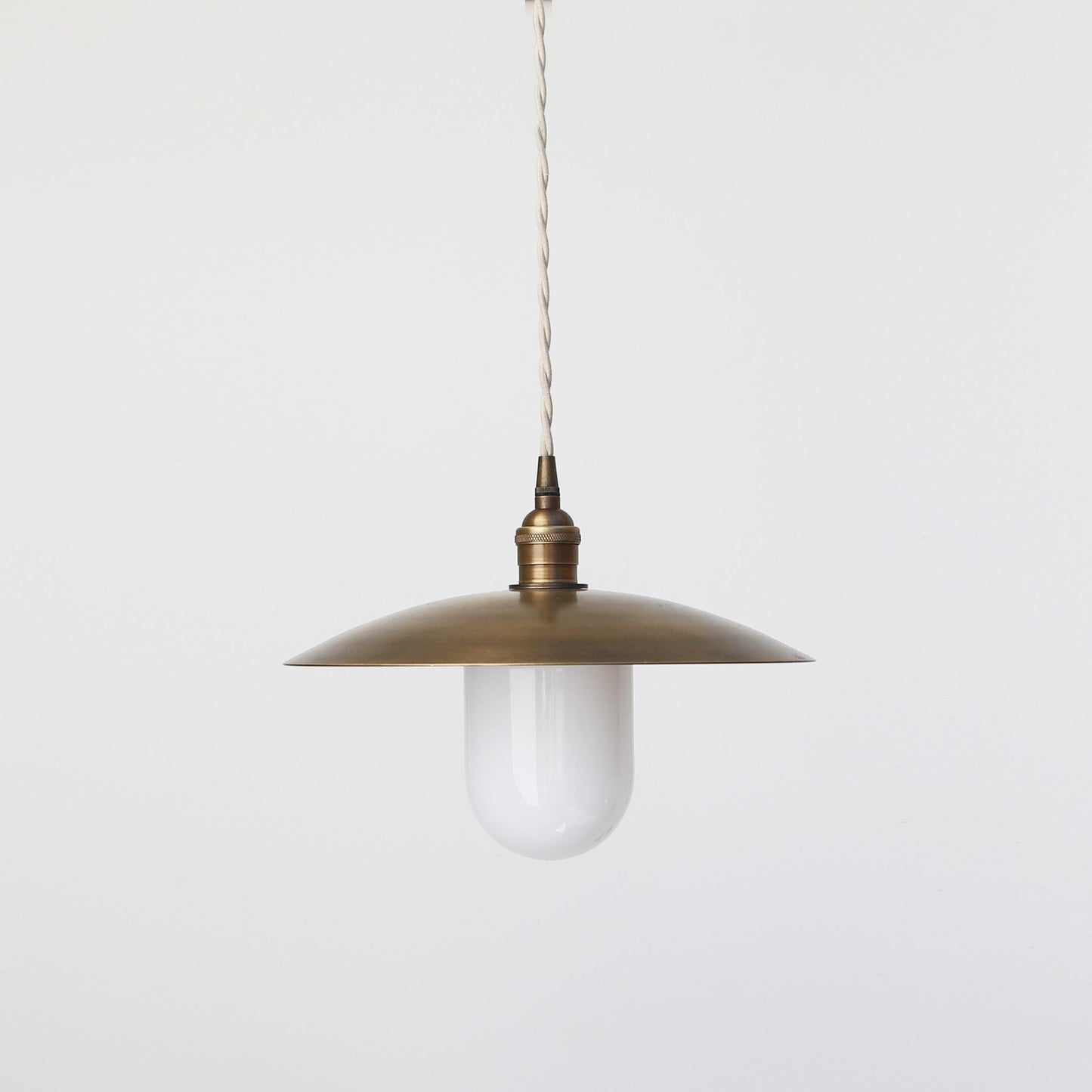 One-Light Cord Pendant with Twelve-Inch Brass Disc Shade