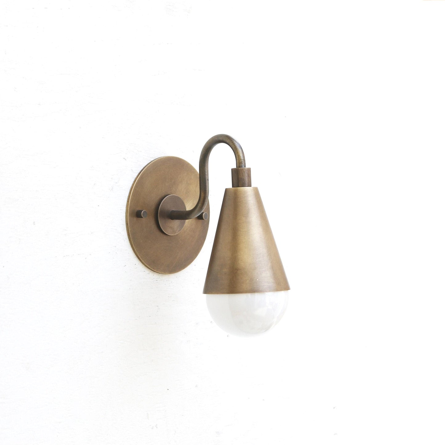 One-Light Curved Arm Wall Sconce with Brass Cone Shade