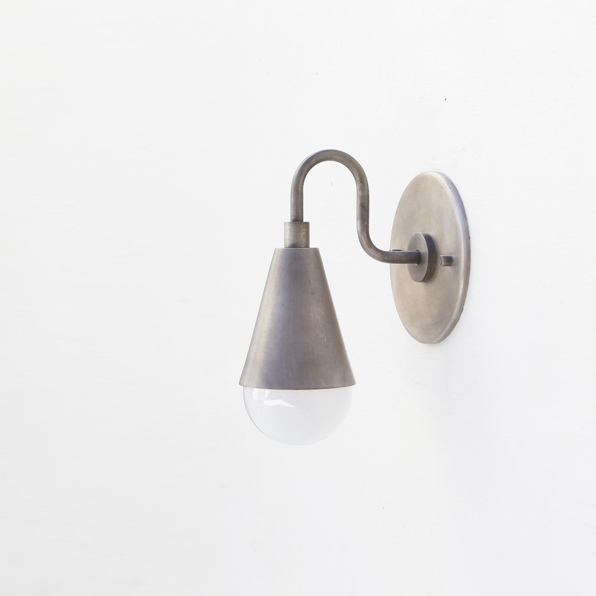 One-Light Curved Arm Wall Sconce with Brass Cone Shade