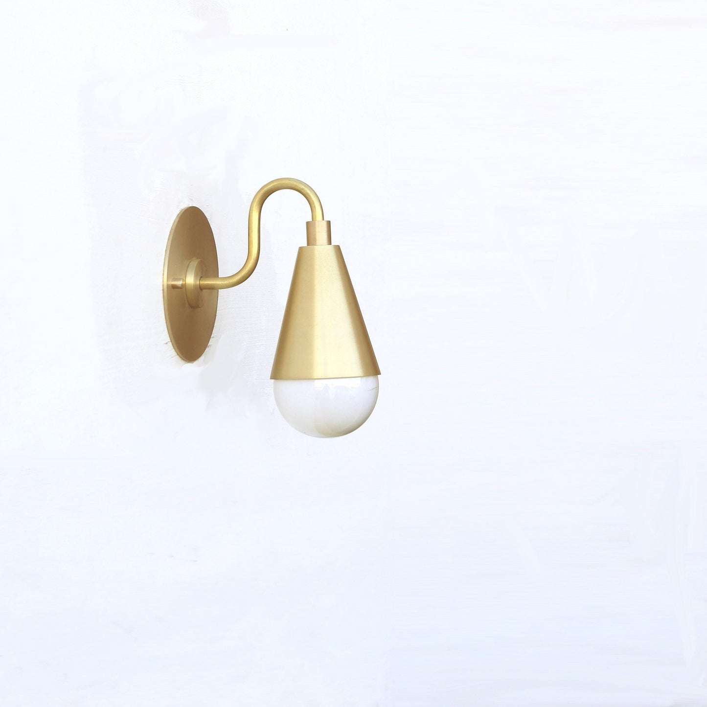 One-Light Curved Arm Wall Sconce with Brass Cone Shade