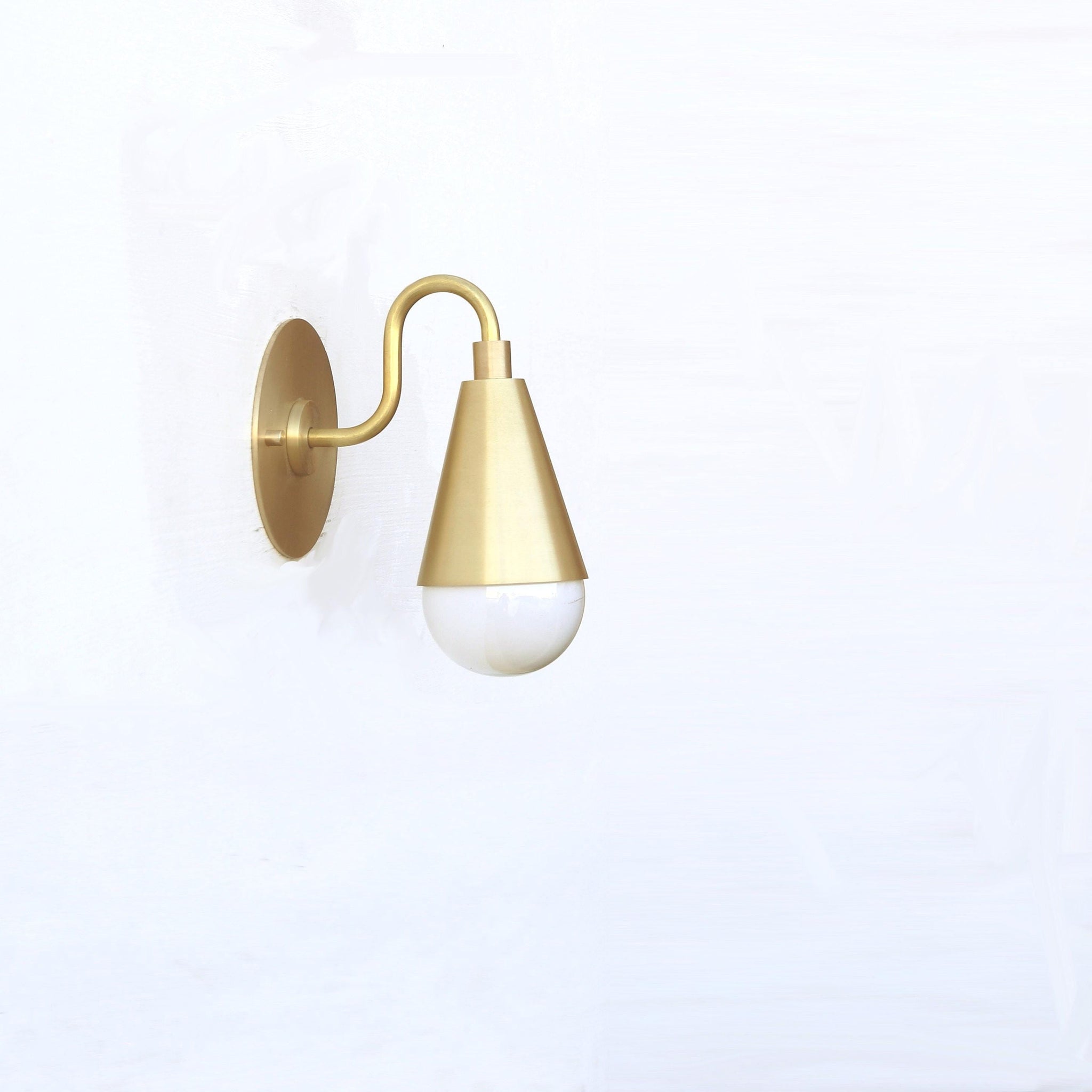 One-Light Curved Arm Wall Sconce with Brass Cone Shade