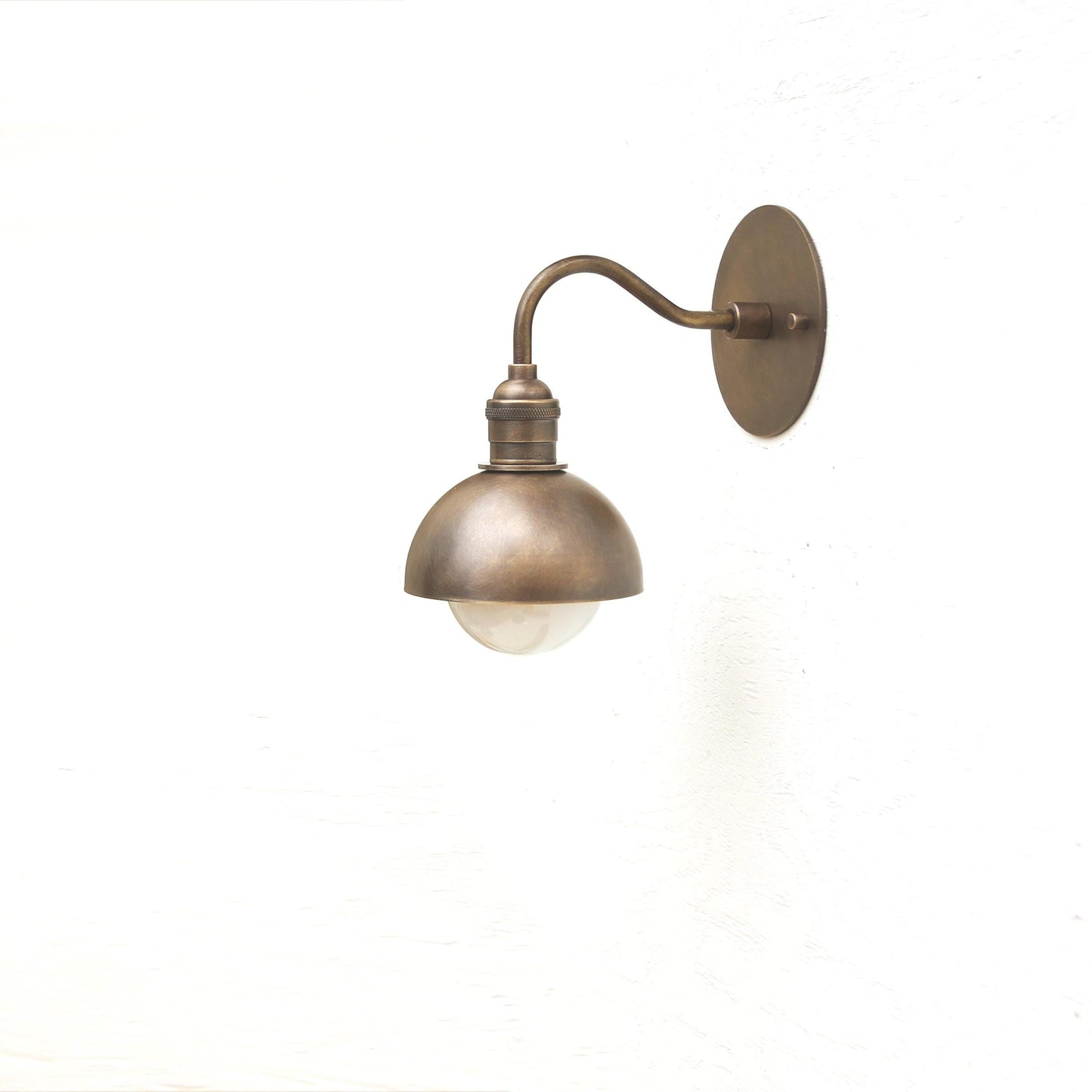 One-Light Curved Arm Wall Sconce with Brass Dome Shade