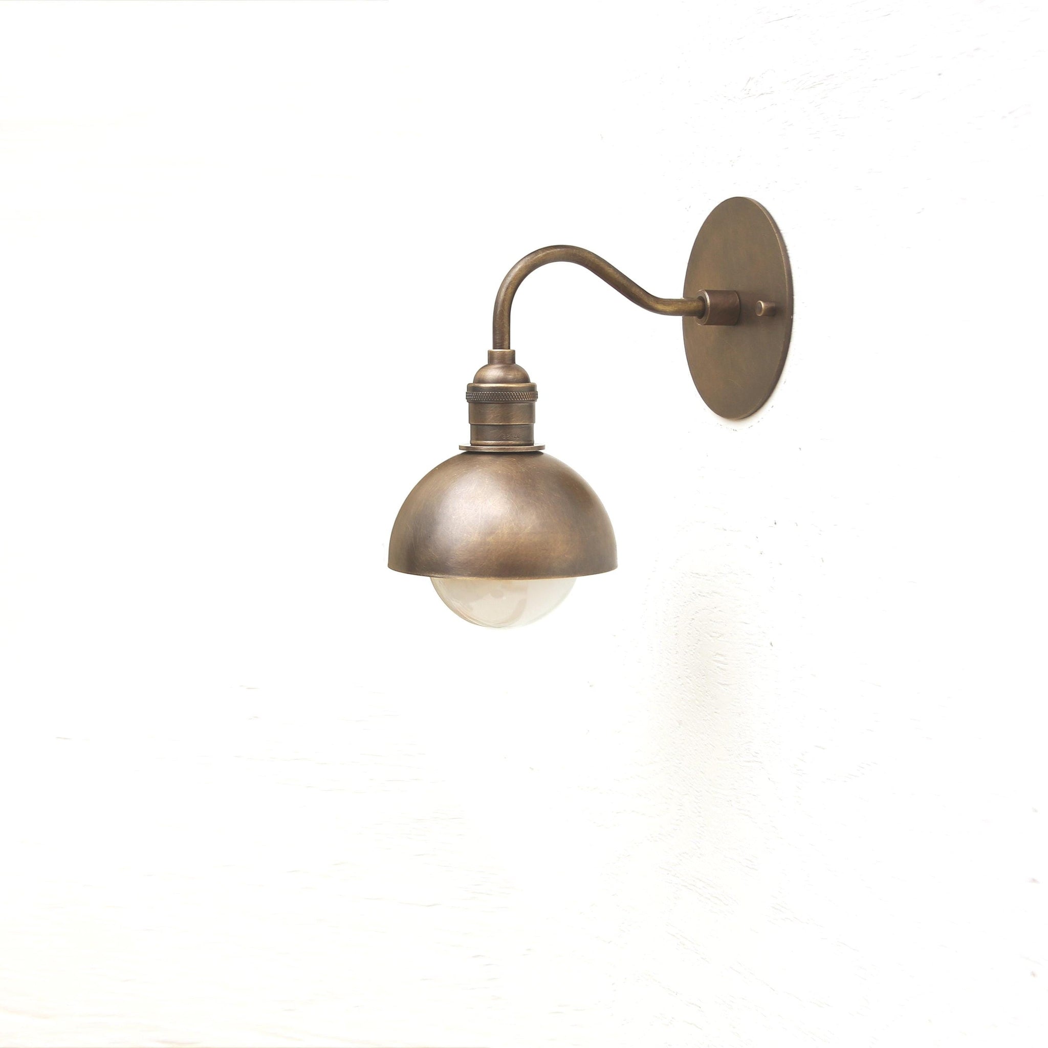 One-Light Curved Arm Wall Sconce with Brass Dome Shade