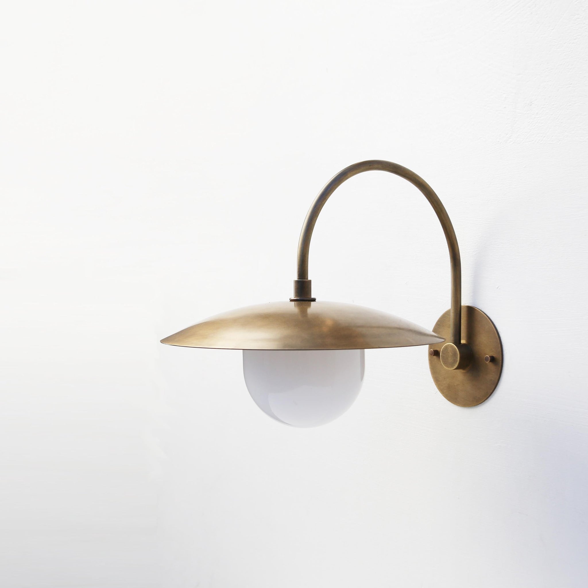 One-Light Gooseneck Wall Sconce with 12-Inch Brass Disc Shade