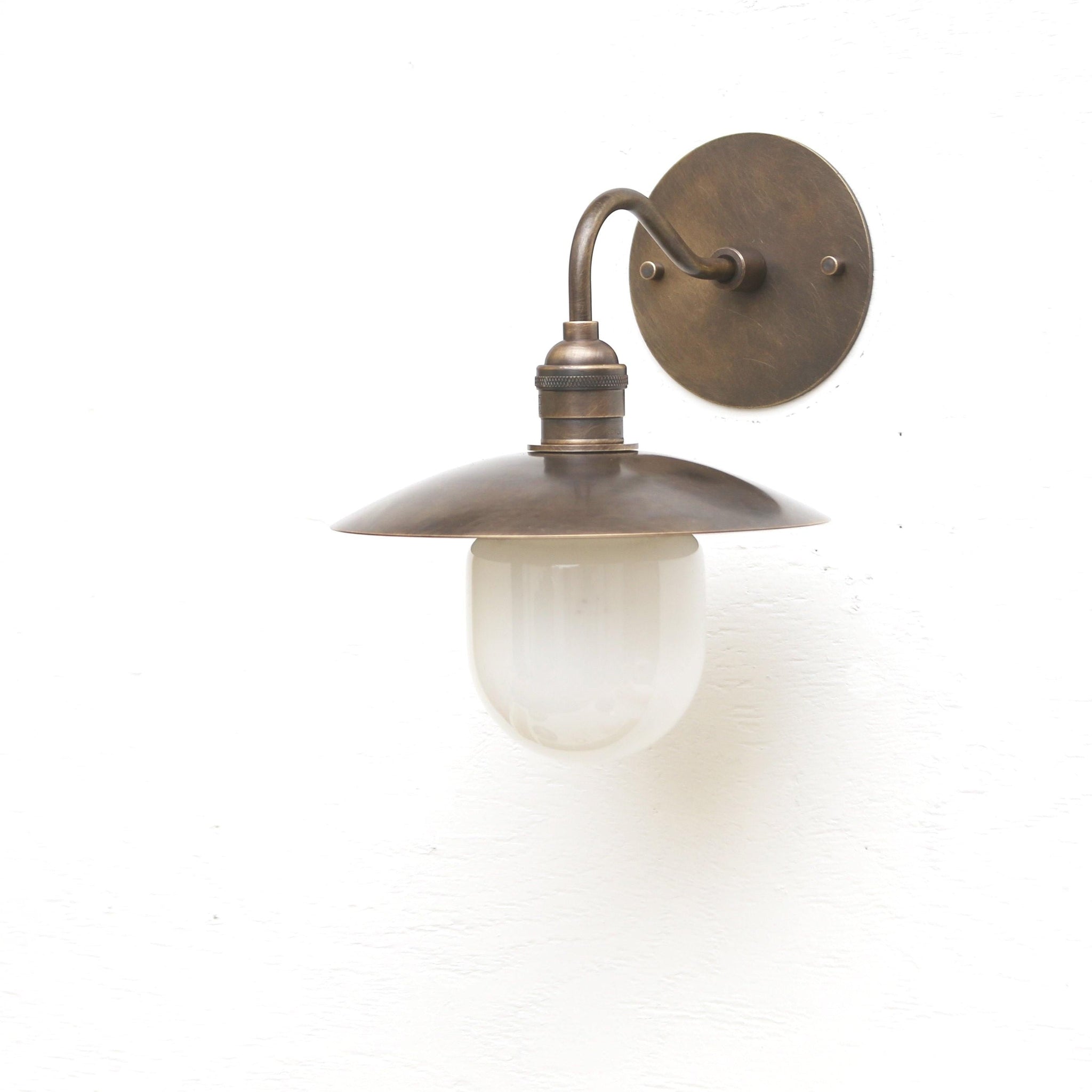 One-Light Industrial Wall Sconce with Brass Shade and Milk Glass Diffuser