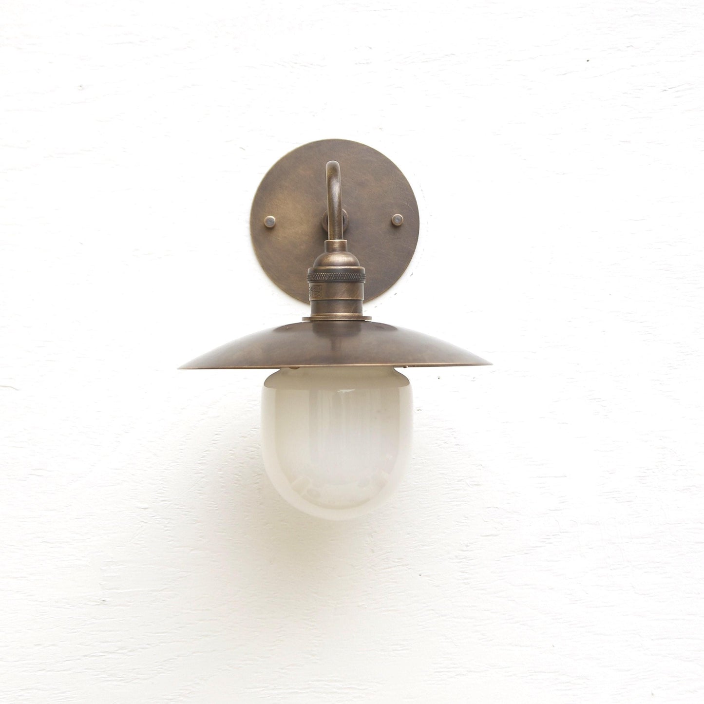 One-Light Industrial Wall Sconce with Brass Shade and Milk Glass Diffuser