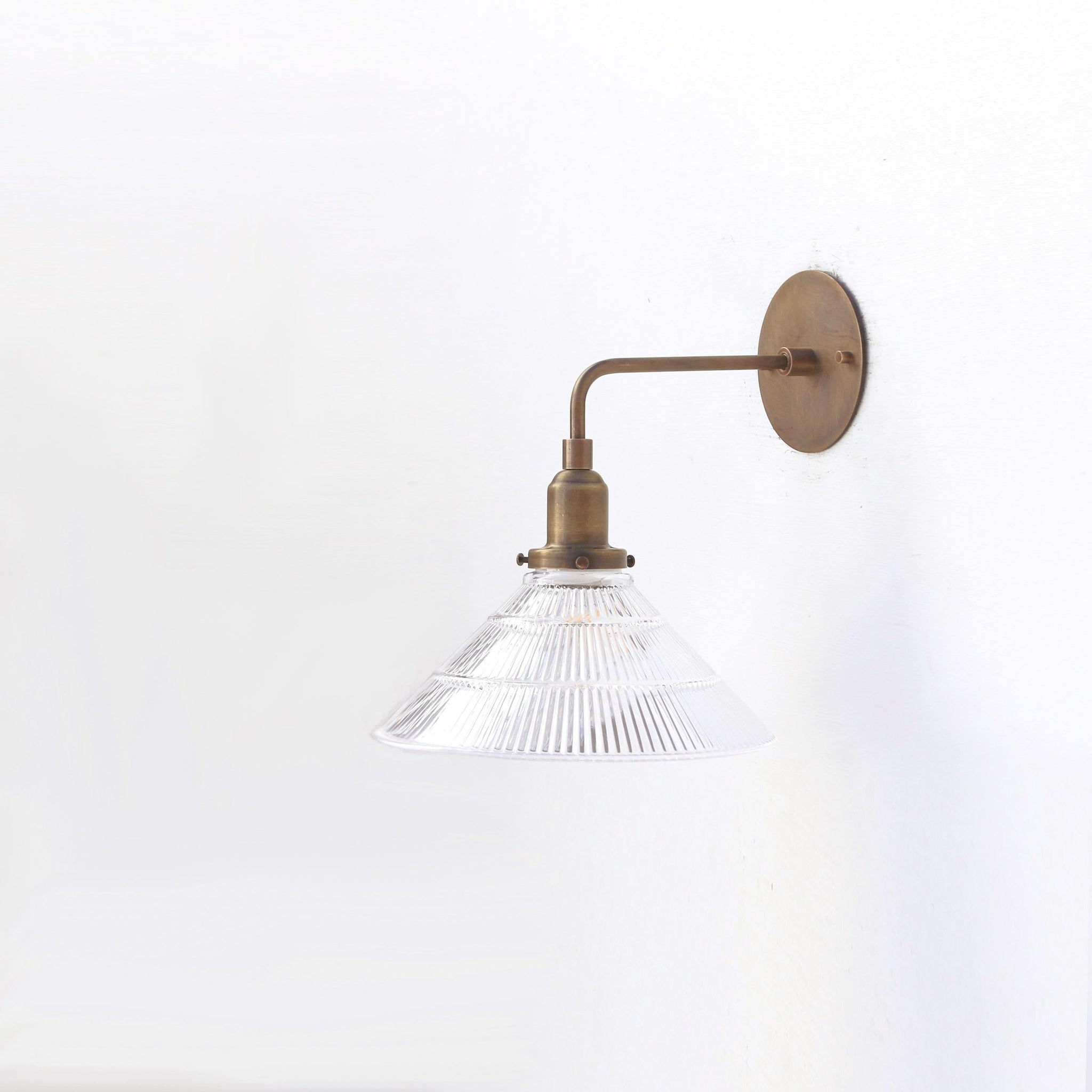 One-Light Industrial Wall Sconce with Ribbed Clear Glass Shade